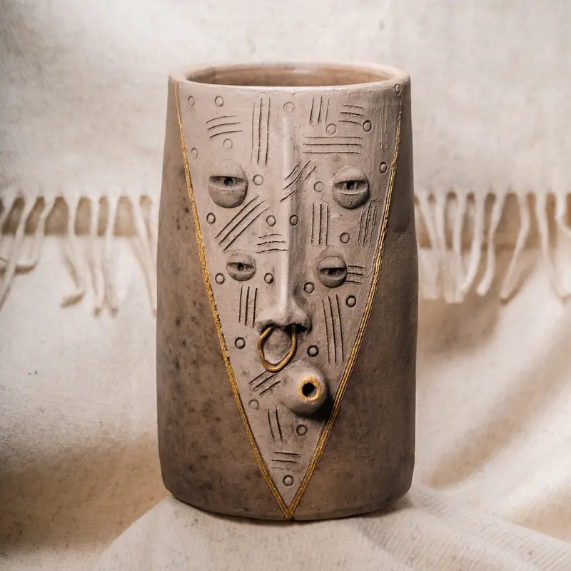 The Knowing Tall Planter
